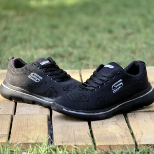 حرااج هیجان انگیز کفش کتونی اسپرت مردانه و پسرانه مدل اسکیچرز بزرگپا  محکم و بادوام رنگ مشکی زیره سفید با ارسال رایگان