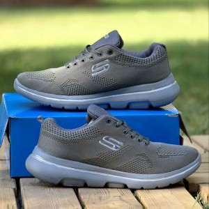 فرووش هیجان انگیز کفش کتونی اسپرت مردانه و پسرانه مدل اسکیچرز بزرگپا  سبک ومستحکم رنگ طوسی تمام با ارسال رایگان