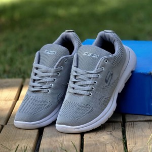 فرووش هیجان انگیز کفش کتونی اسپرت مردانه و پسرانه مدل اسکیچرز بزرگپا  سبک ومستحکم رنگ طوسی تمام با ارسال رایگان