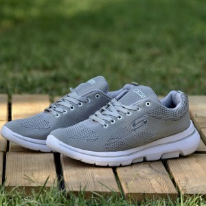 فرووش هیجان انگیز کفش کتونی اسپرت مردانه و پسرانه مدل اسکیچرز بزرگپا  سبک ومستحکم رنگ طوسی تمام با ارسال رایگان