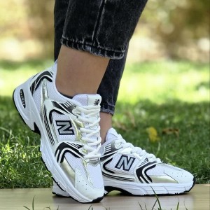 تخفیف فوق العاده کفش کتونی اسپرت ست مردانه زنانه مدل نیوبالانس 530 سبک و نرم رنگ سفید سرمه ای با ارسال رایگان