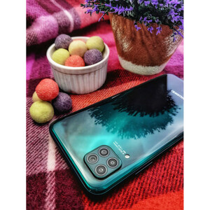 گوشی موبایل هوآوی مدل Nova 7i دو سیم کارت ظرفیت 128 گیگابایت به همراه شارژر همراه کینگ استار مدل KP 10026 ظرفیت 10000 میلی آمپر ساعت