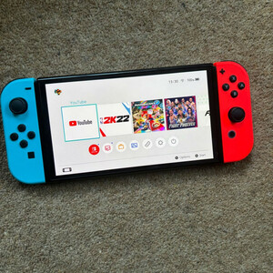 کنسول بازی هیبریدی نینتندو مدل Switch - OLED Neon Blue and Neon Red ظرفیت 64 گیگابایت