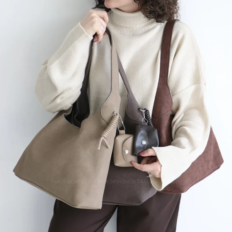 کیف زنانه بزرگ جیر مدل سیمبل