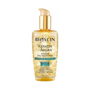 روغن ترمیم‌کننده و تقویت‌کننده مو بیوکسین مدل KERATIN & ARGAN با تکنولوژی EXTRA REPAIR حاوی آمینواسید حجم ۱۵۰ میل