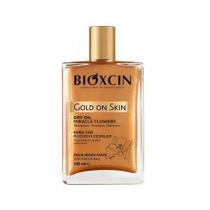 روغن خشک درخشان‌کننده بیوکسین مدل GOLD ON SKIN مناسب صورت، بدن و مو  با ذرات اکلیلی طلایی حجم ۱۰۰ میل