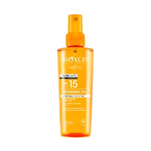 روغن ضد آفتاب و برنزه کننده بیوکسین مدل SUNCARE PROTECTION با SPF15 مناسب انواع پوست حجم ۲۰۰ میل