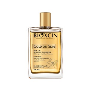 روغن خشک درخشان کننده بیوکسین مدل GOLD ON SKIN مناسب صورت، بدن و مو حجم ۱۰۰ میل