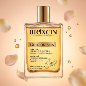 روغن خشک درخشان کننده بیوکسین مدل GOLD ON SKIN مناسب صورت، بدن و مو حجم ۱۰۰ میل