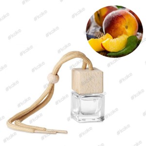 خوشبو کننده رایحه هلو مدل آویزی طرح مکعب (برند کوکه)