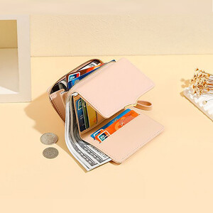 فروش کیف پول زنانه تاشو تائومیک‌میک