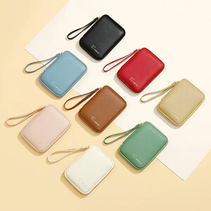 خرید کیف پول و کیف پاسپورت تائومیک