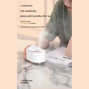 دستگاه رطوبت ساز و آروماتراپی شارژی طرح کوه یخ چرخان