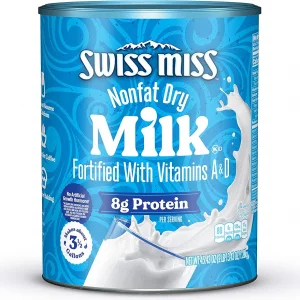 شیر خشک بدون چربی برند  Swiss Miss با ویتامین‌های A و D مخصوص بزرگسالان وزن  1280 گرمی
