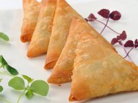 سـمبـوســه‌ خـــرما
