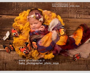 عکس نوزاد با تم دورپیچ رنگارنگ و پروانه 